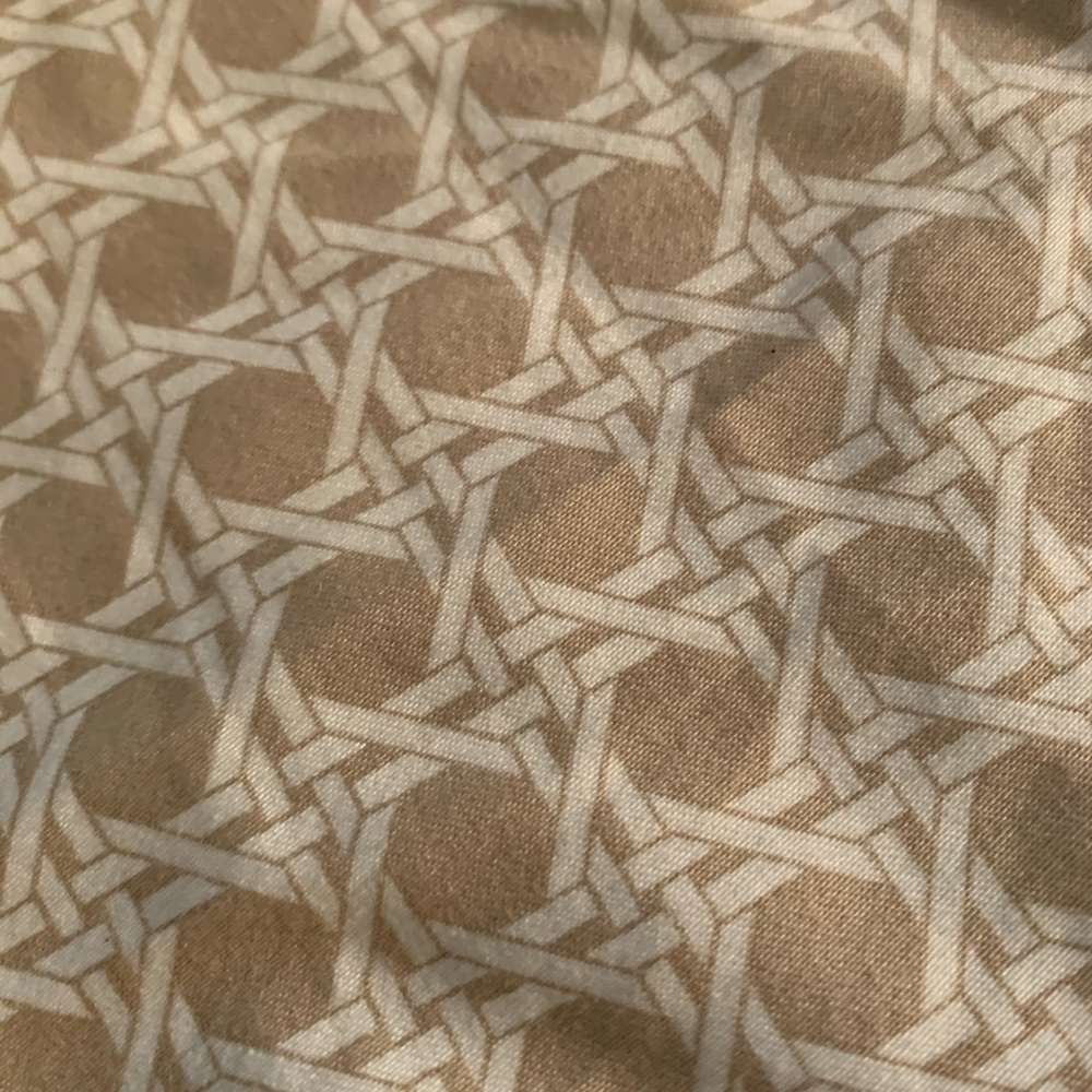 Tan and white patterned dress pants with pockets